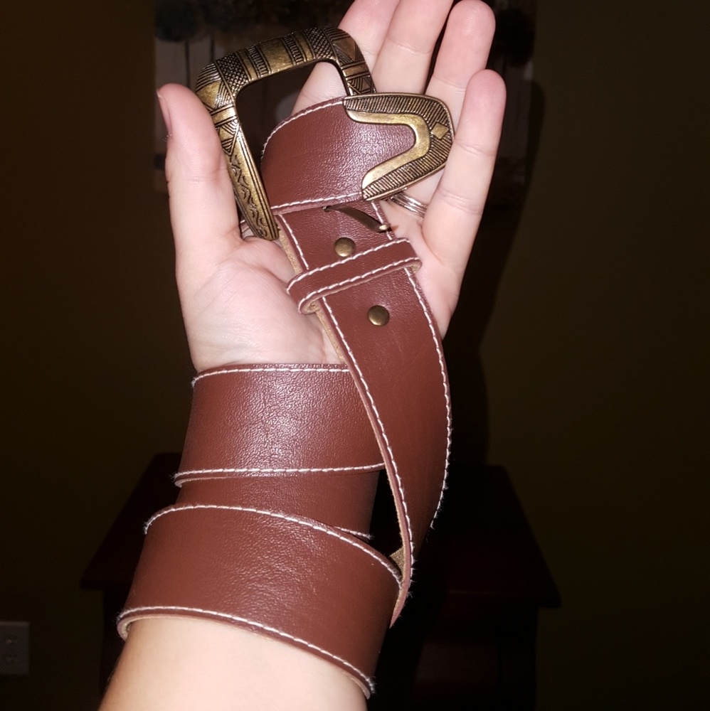 Brown belt with metal accents